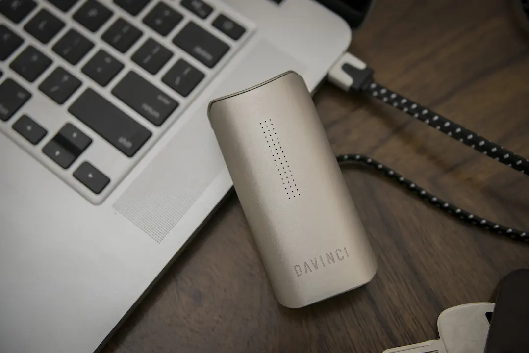 Image of a davinci iq vaporizer on laptop