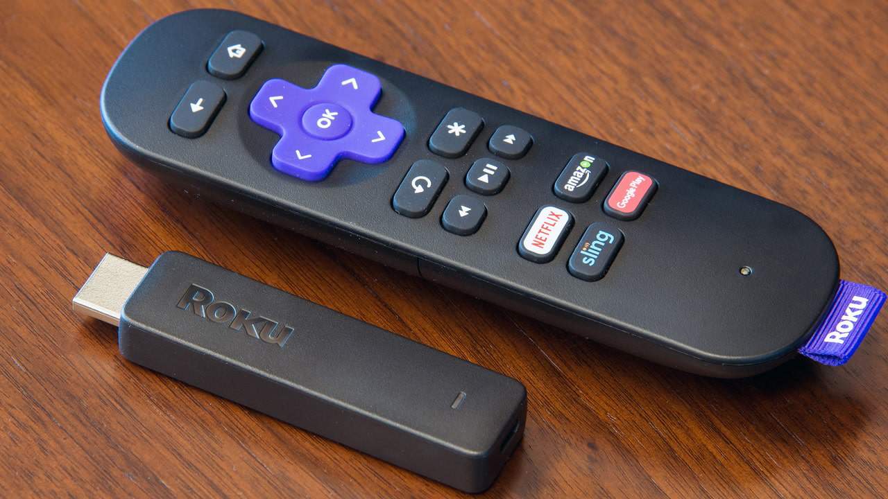 Roku streaming stick and remote on table