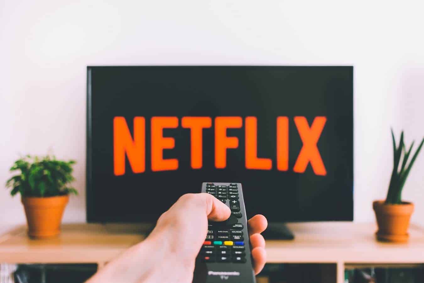 Person opening up netflix on their tv