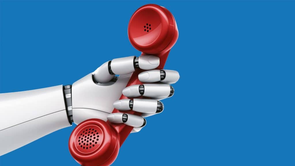 phone being held by a robot for robocalls