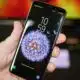 man holding galaxy s9 smartphone