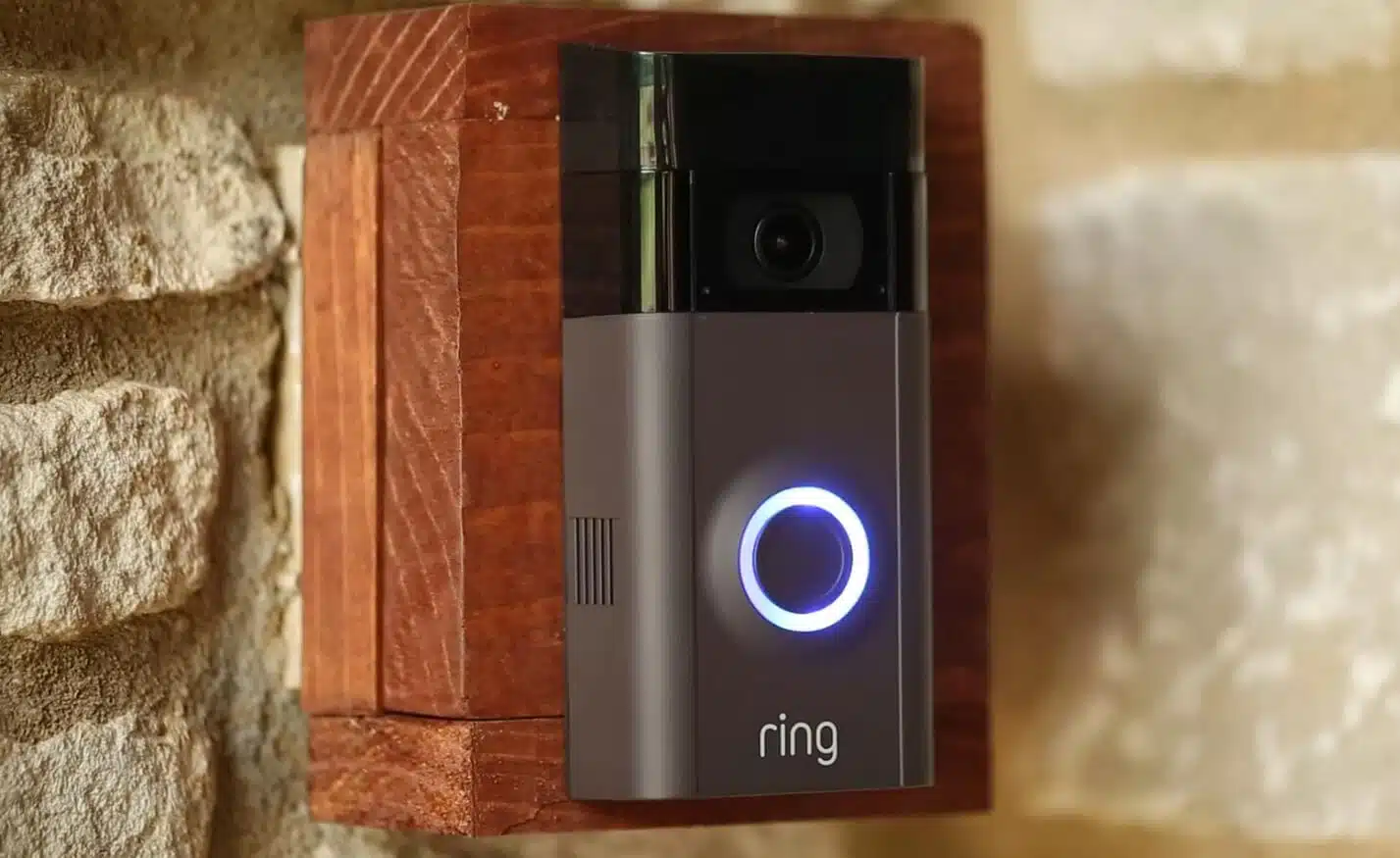 grey ring video doorbell on door