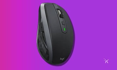 logitech mx anywhere 2s mouse on a purpel background