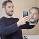 a picture of a man tricking facial recognition by using a 3D printed head