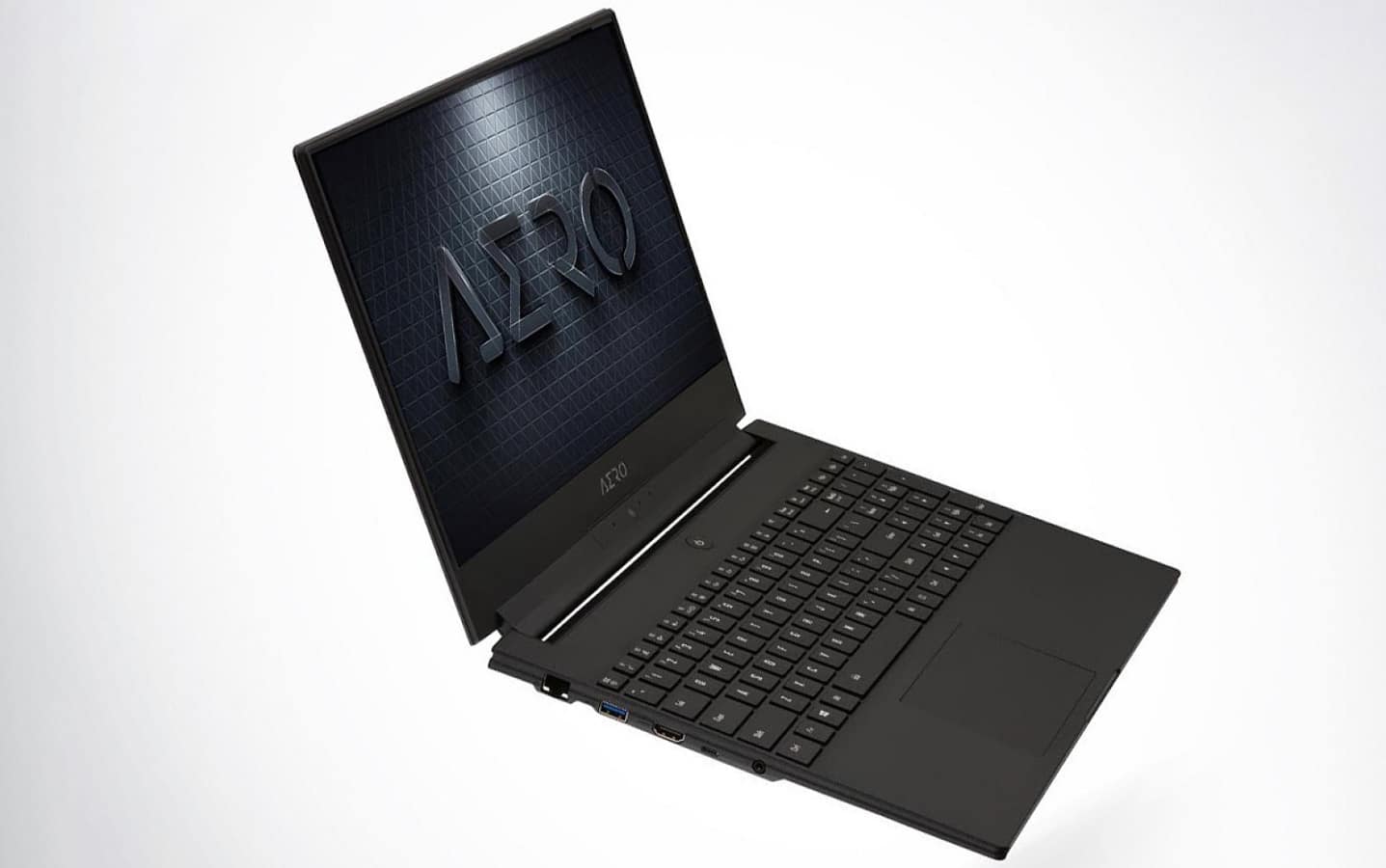 gigabyte aero laptop with ai on grey background