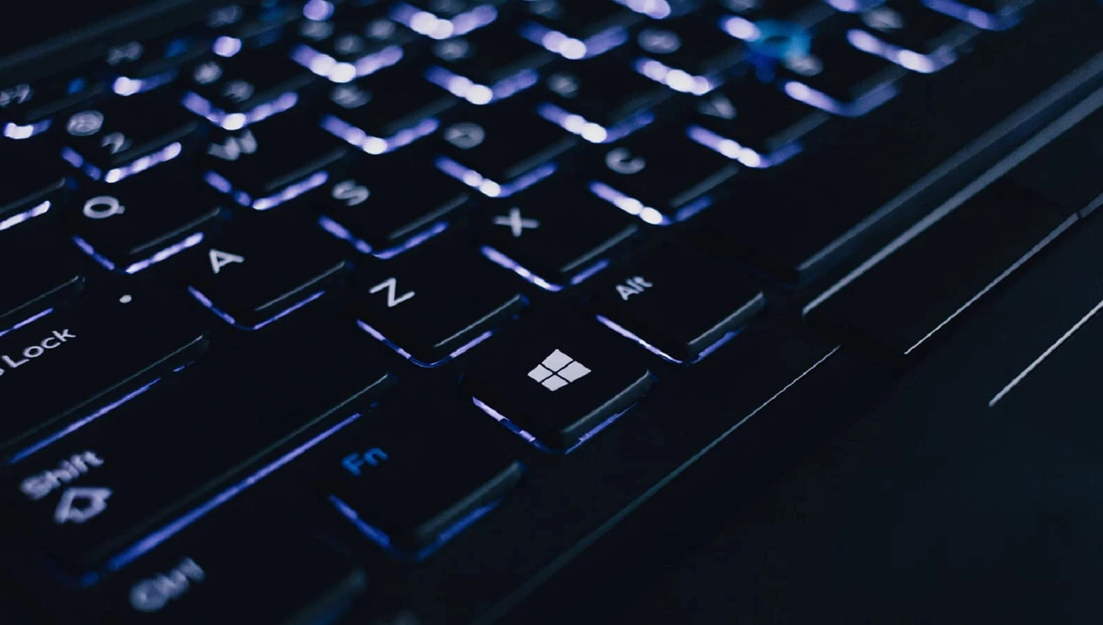 backlit keyboard showing various keys mega breach hack