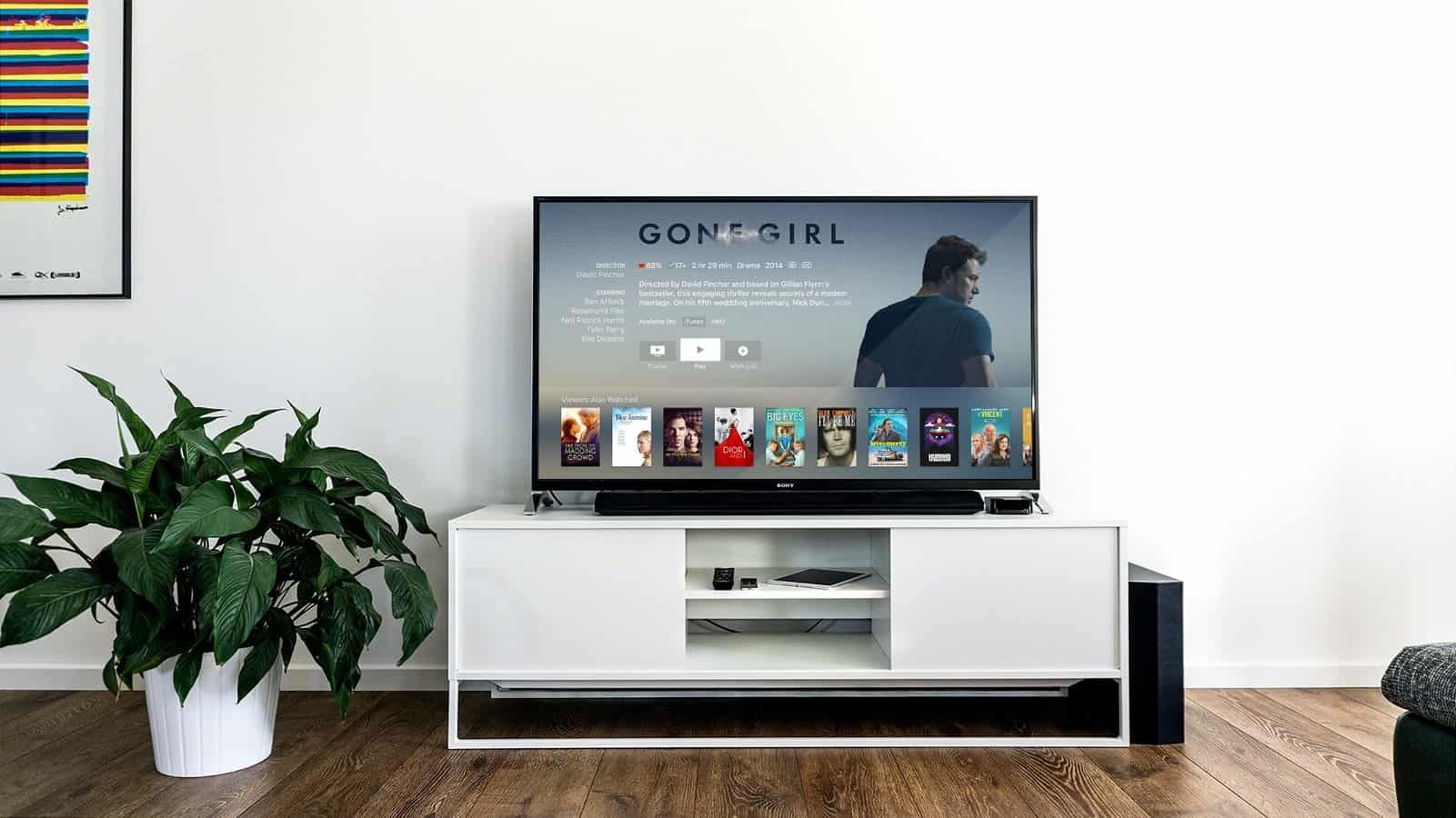 Smart tv on white stand