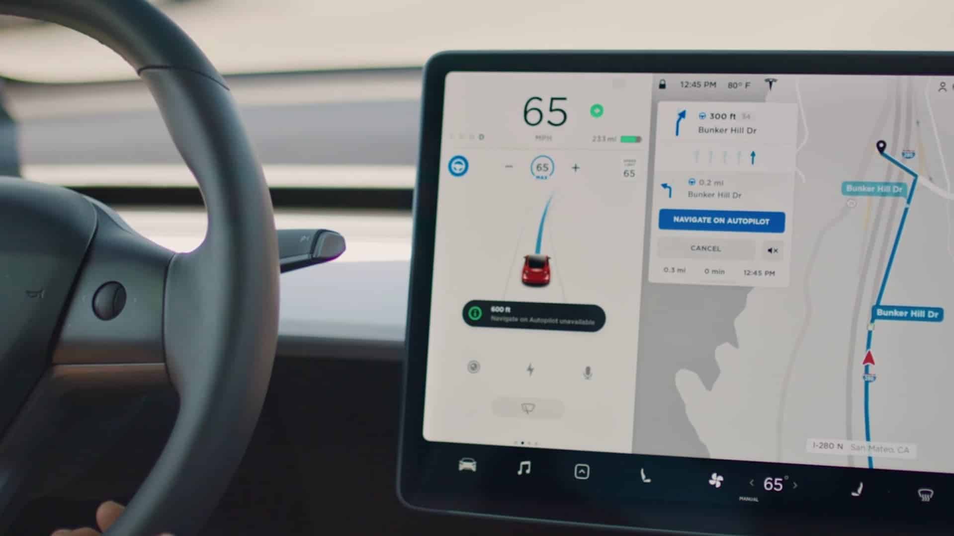 Tesla vehicle showing navigate on autopilot feature on model 3