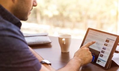 User using linkedin on a tablet