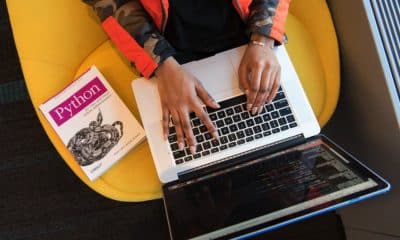 woman programming on a laptop