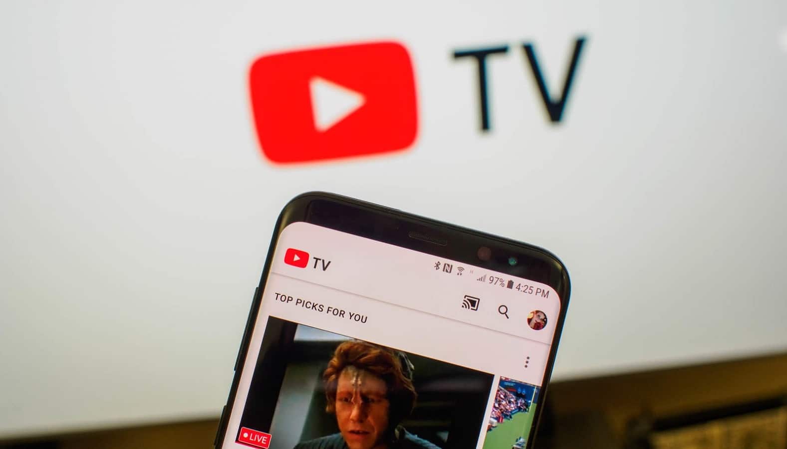 youtube tv shown on screen and phone