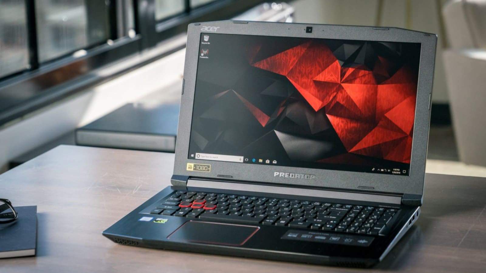 acer predator helios 300 on table