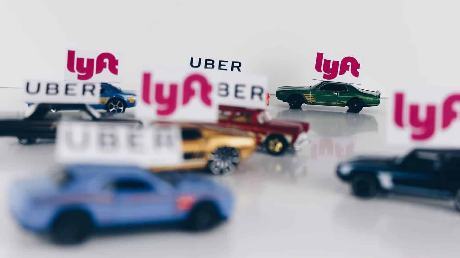 uber and lyft ride-hailing toy cars on table jalopnik study