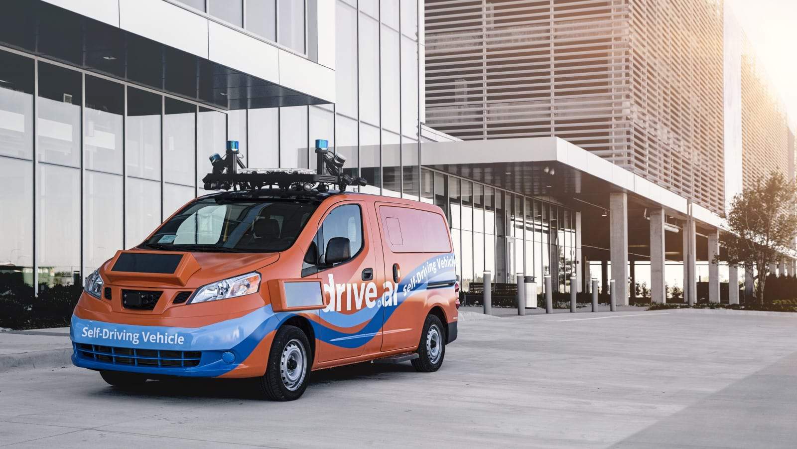 Drive. Ai self driving van in front of buildings