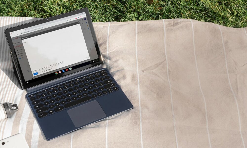 google pixel slate tablet on blanket on grassy field