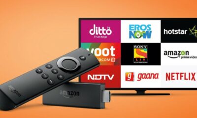 Amazon fire tv streaming stick in front of a tv