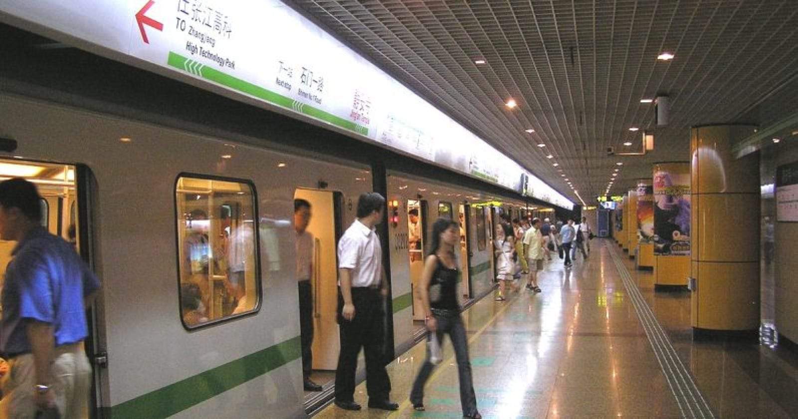 people getting off a subway car in china with face recognition