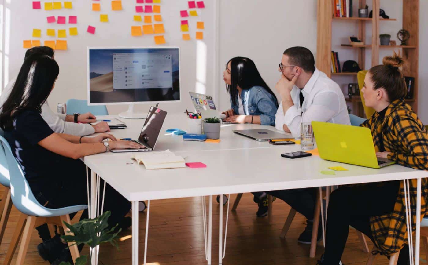 startup product reviews office meeting