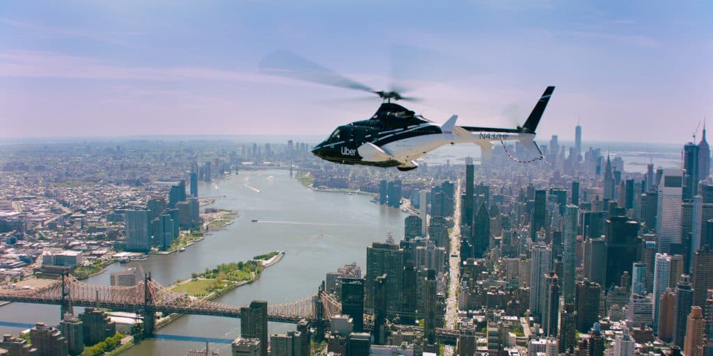 uber copter flying over nyc