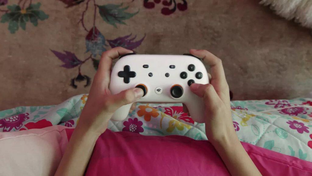 google stadia controller in hand