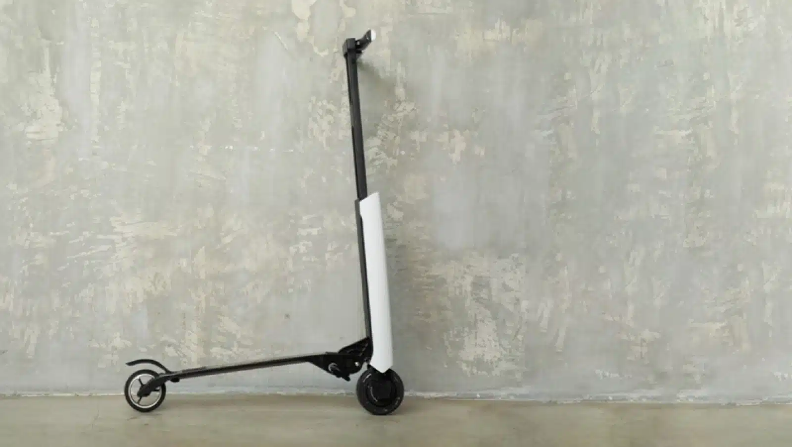 white scooter against wall crowdfunding