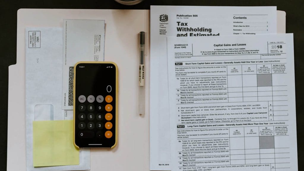 tax paperwork and calculator