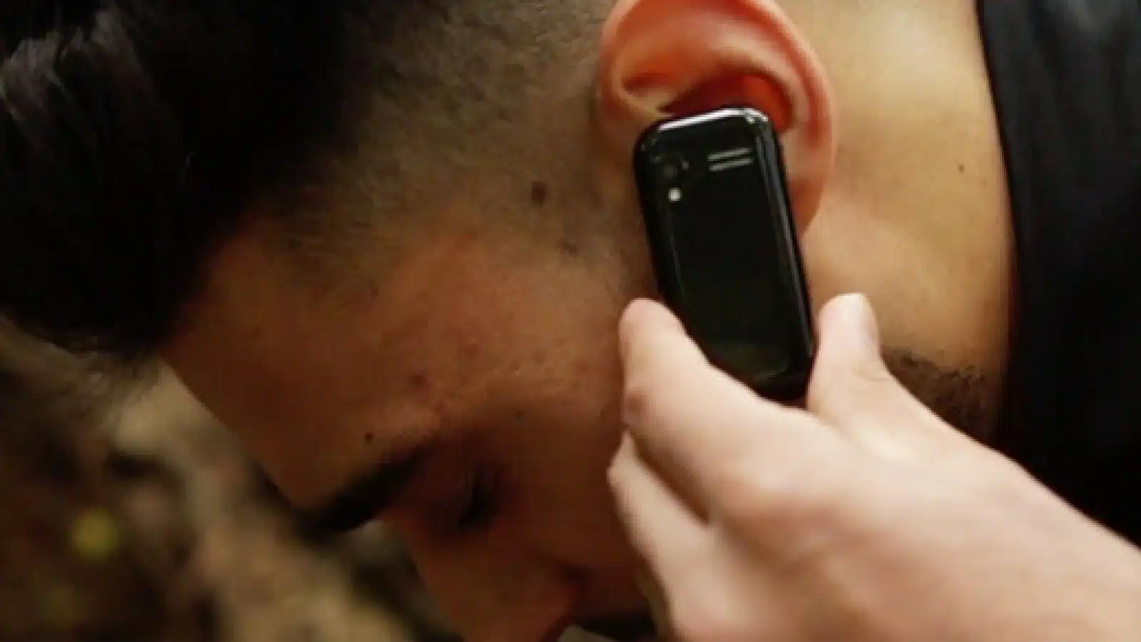 tiny phone in ear crowdfunding campaign