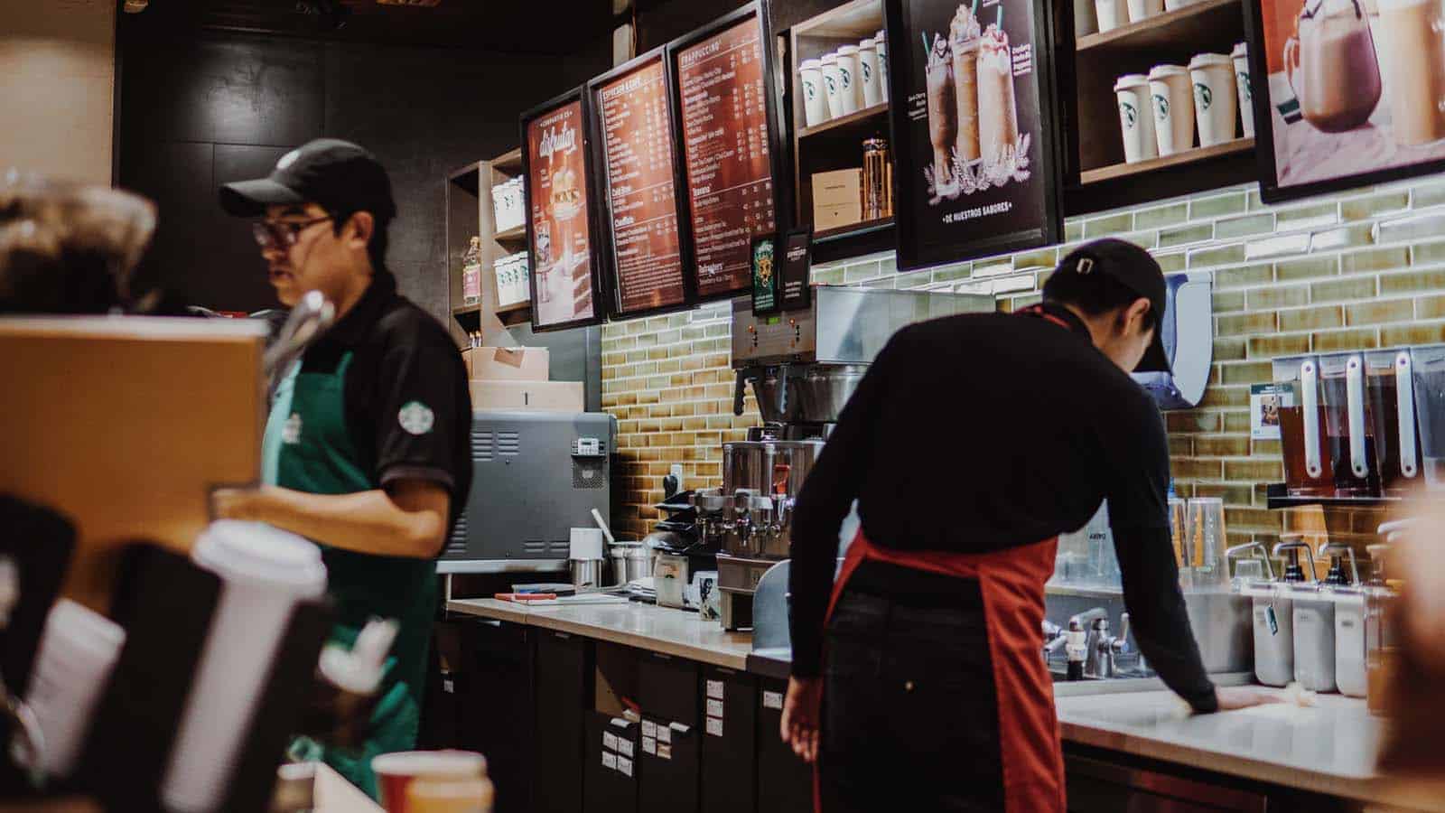 starbucks coffee shop with people working