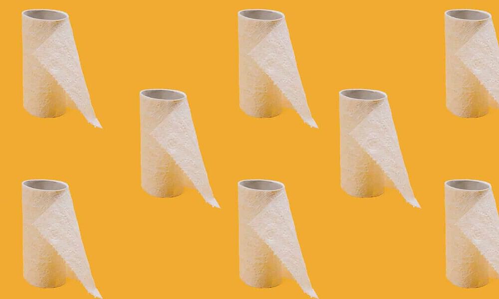 toilet paper on yellow background