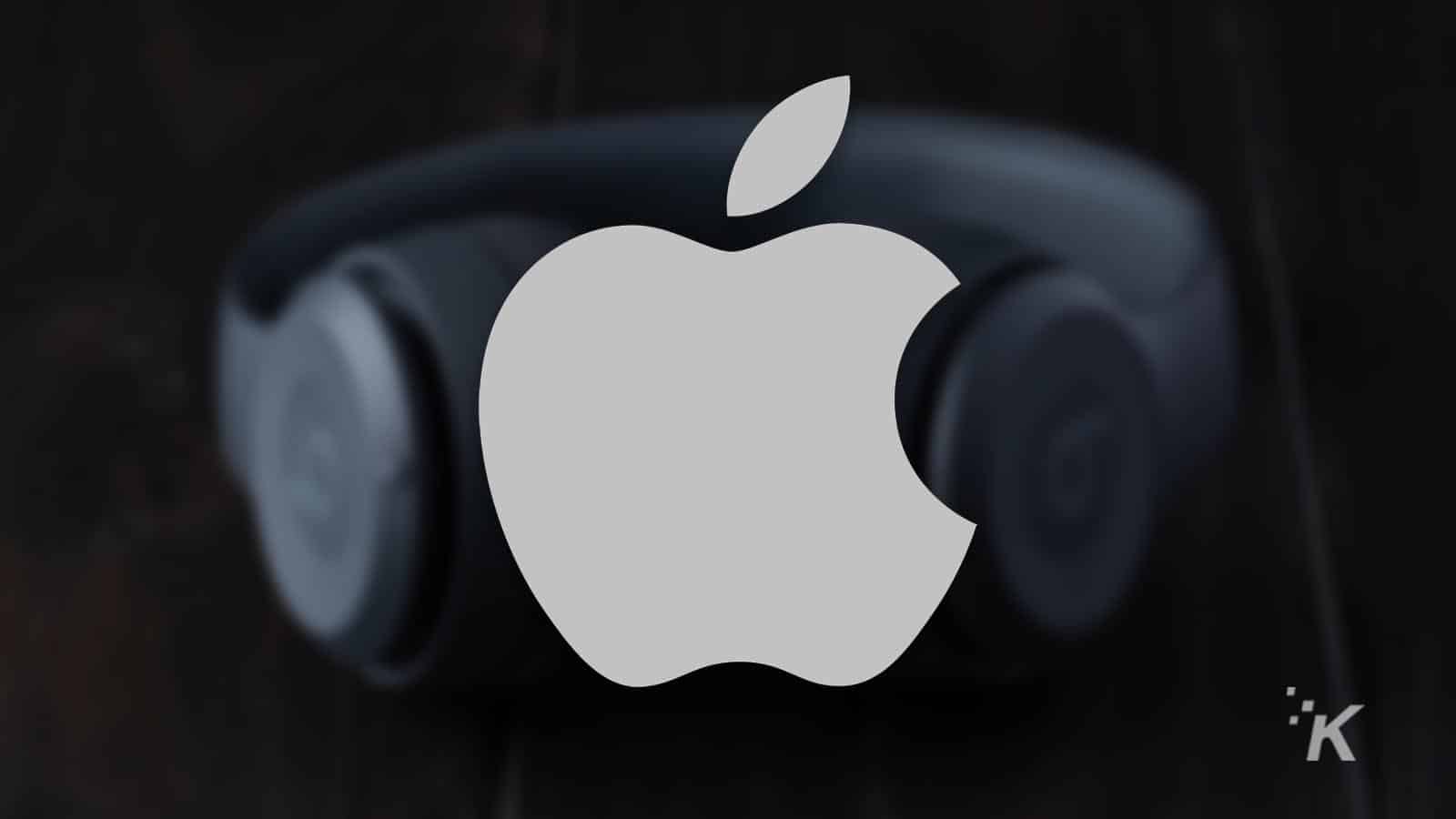 apple logo with headphones in the background for airpods studio