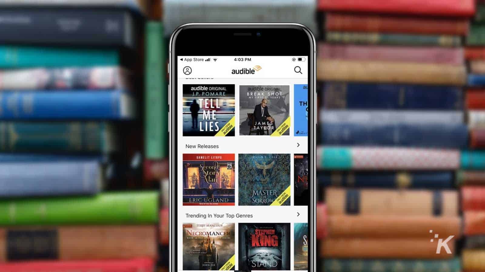 Audible app on book background