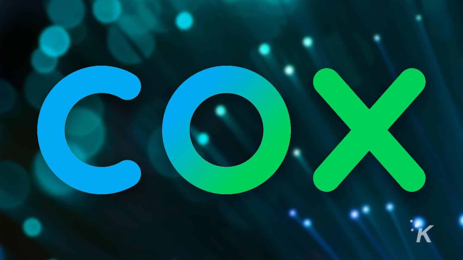 cox logo on blurred background. 