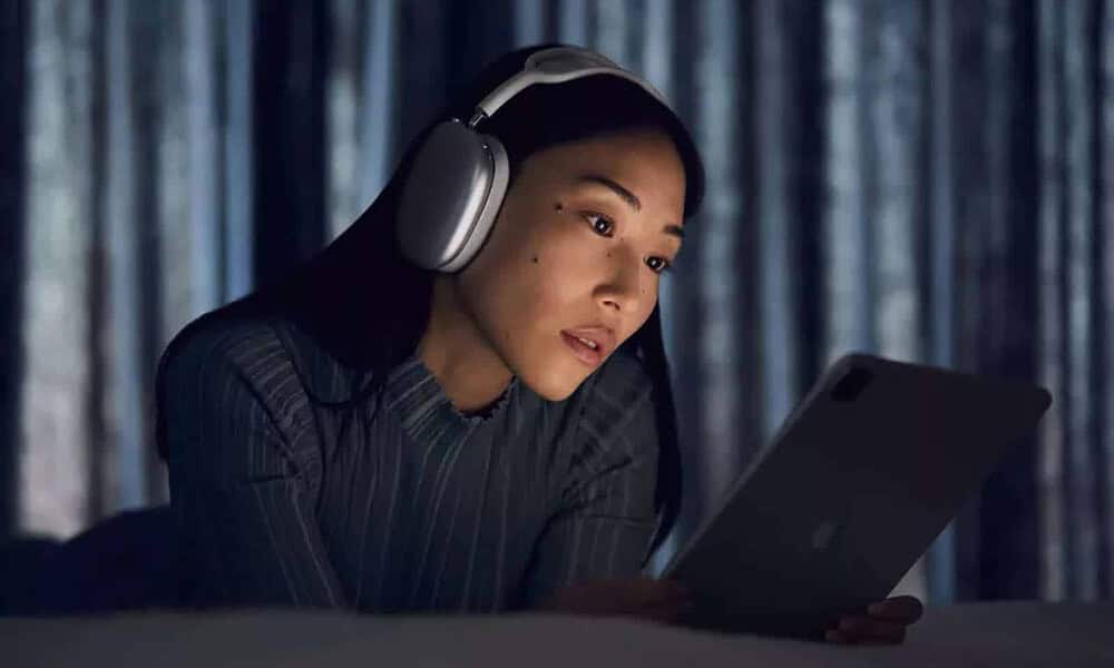woman wearing airpods max headphones