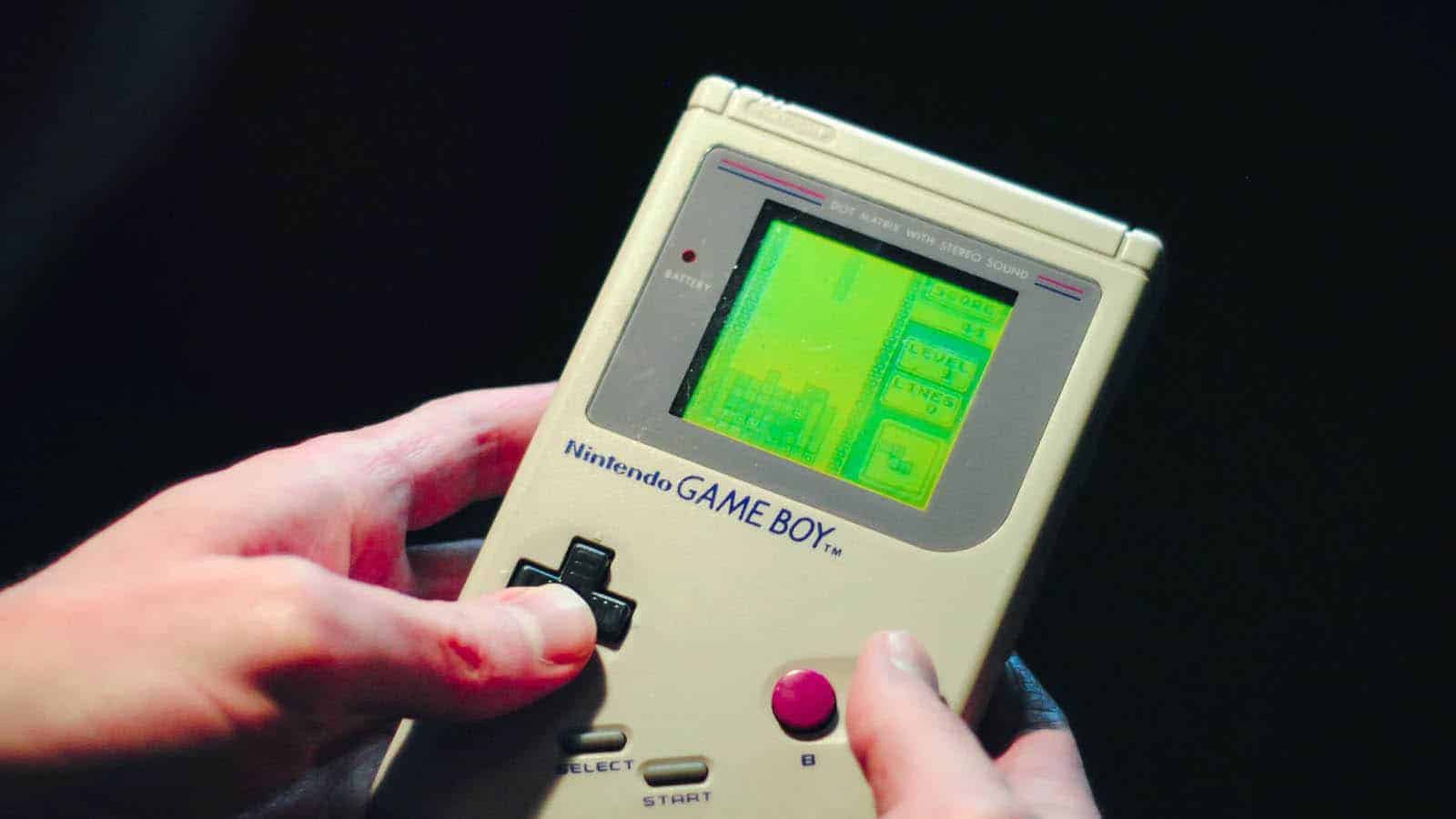 Person holding a game boy