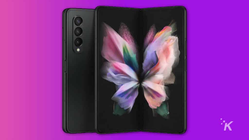 samsung galaxy z fold 3 handset on purple background