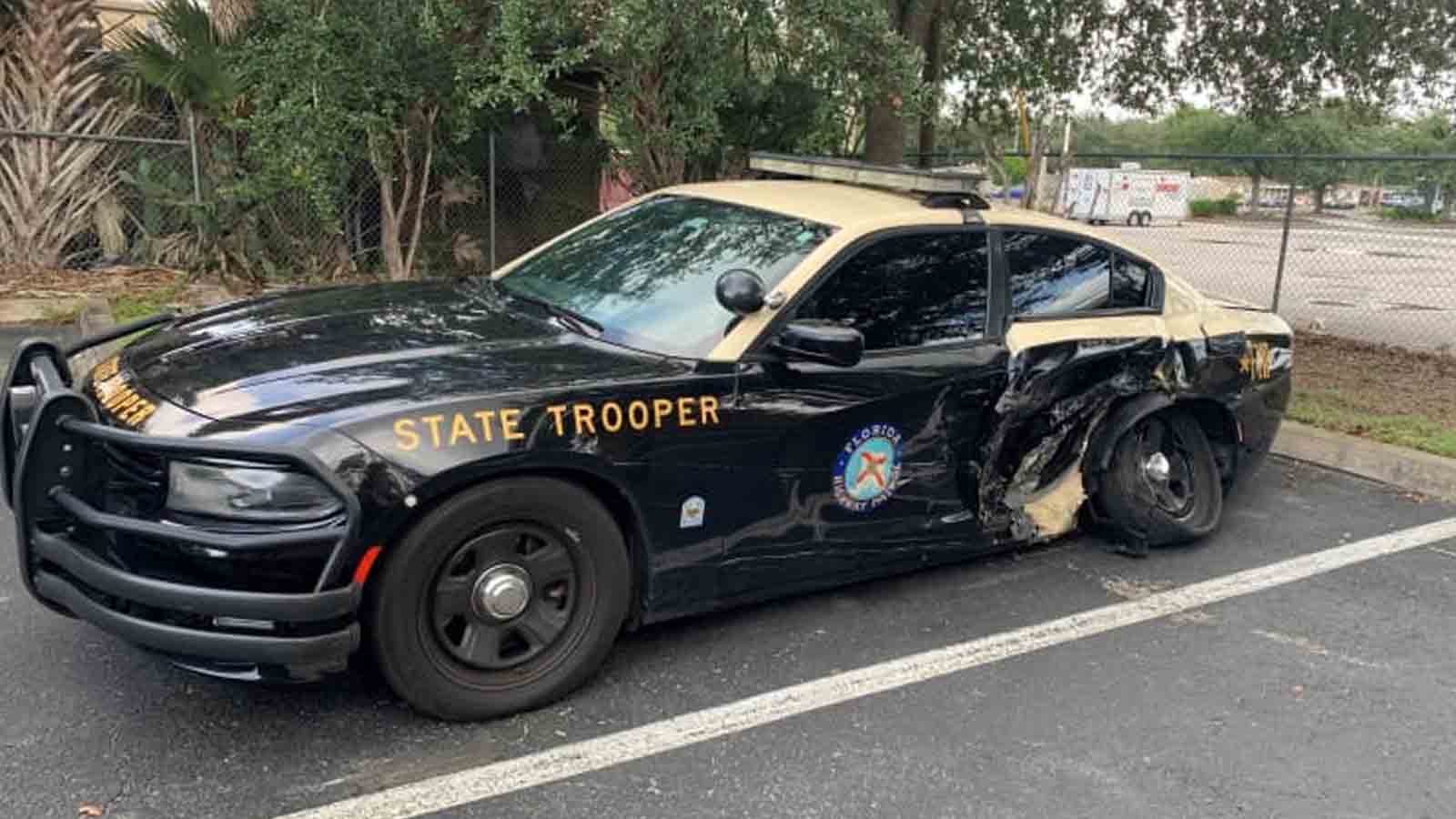 tesla autopilot crash into cop car in florida