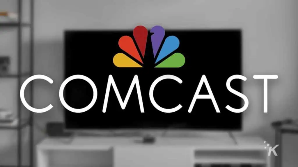 Comcast logo with blurred tv background