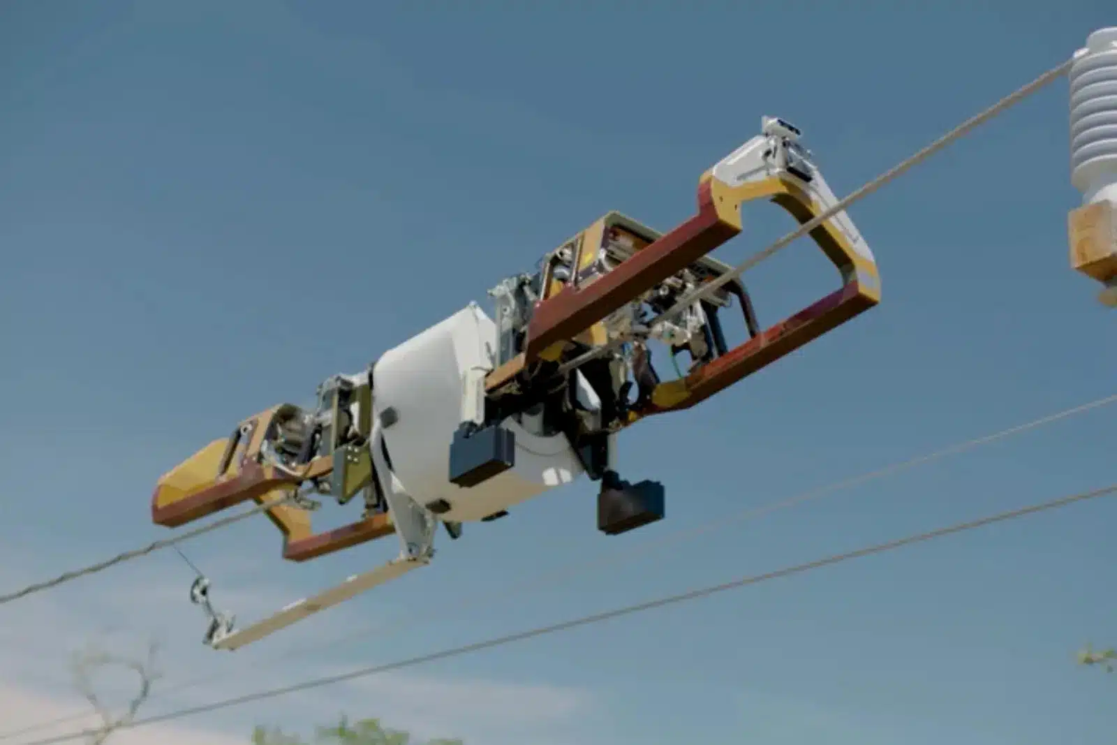 facebook fiber cable laying robot wrapping cable around an overhead power cable