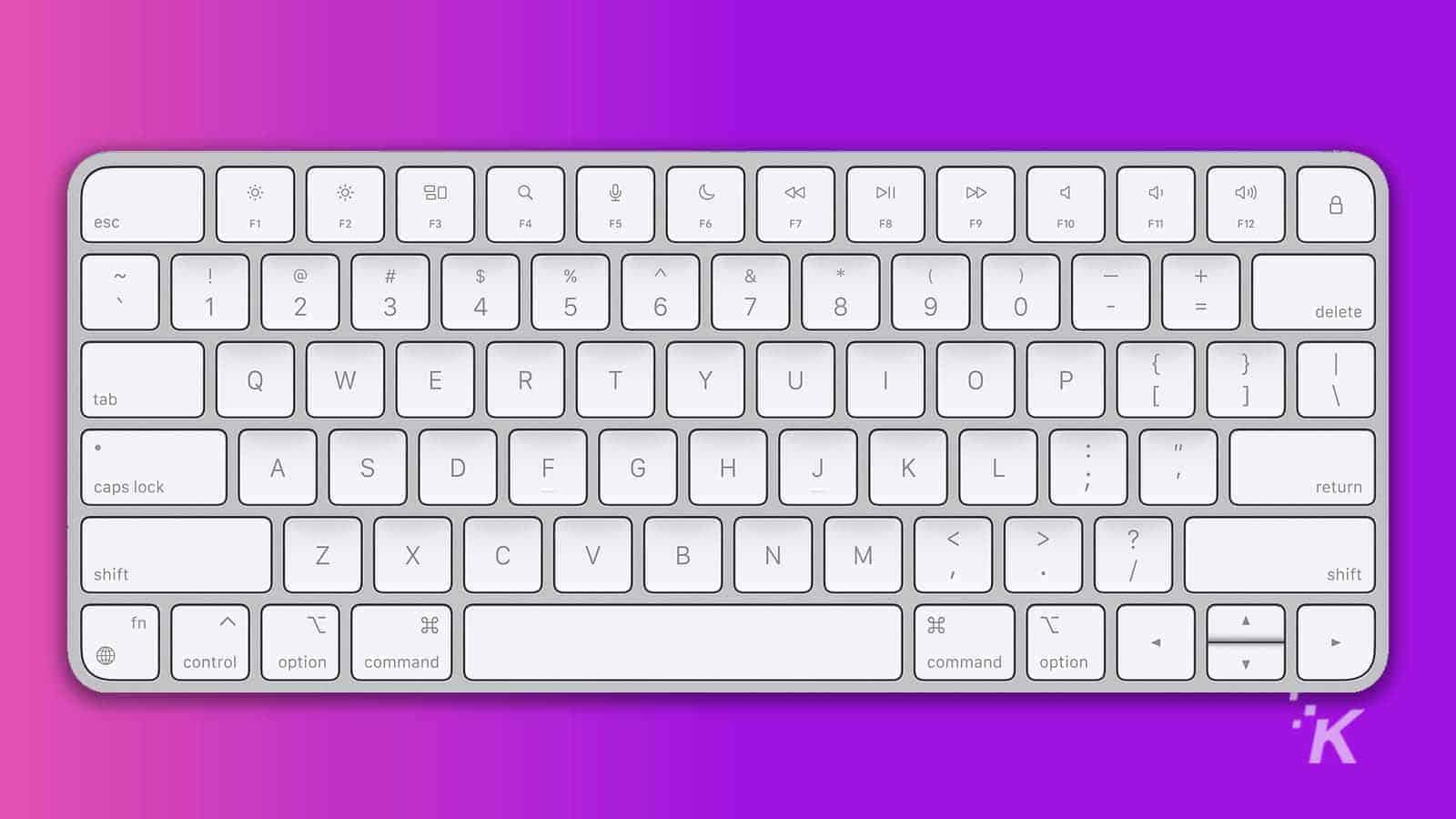 mac keyboard on purple background