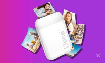 mini portable photo printer on a purple background