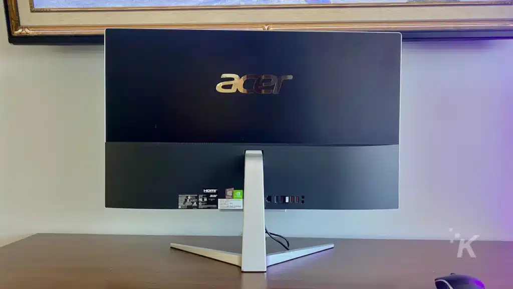 the back of an acer aspire all in one pc placed on a desk