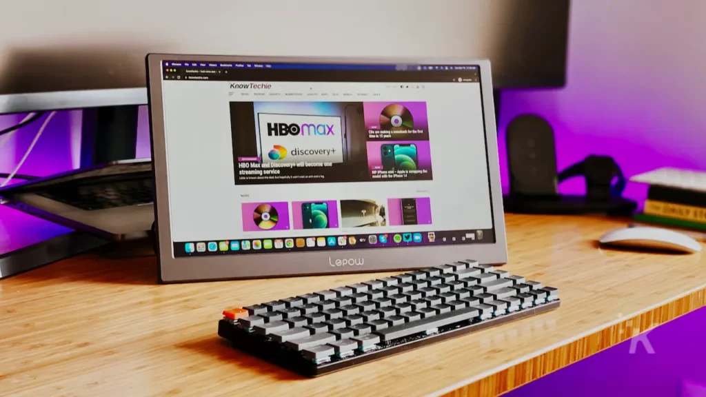 Portable monitor and keyboard on a desk