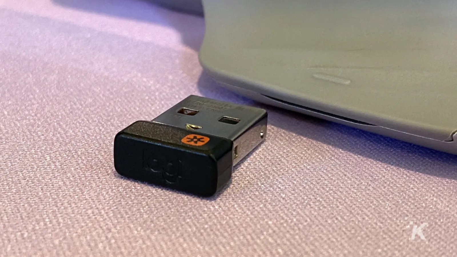 logitech dongle on a desktop