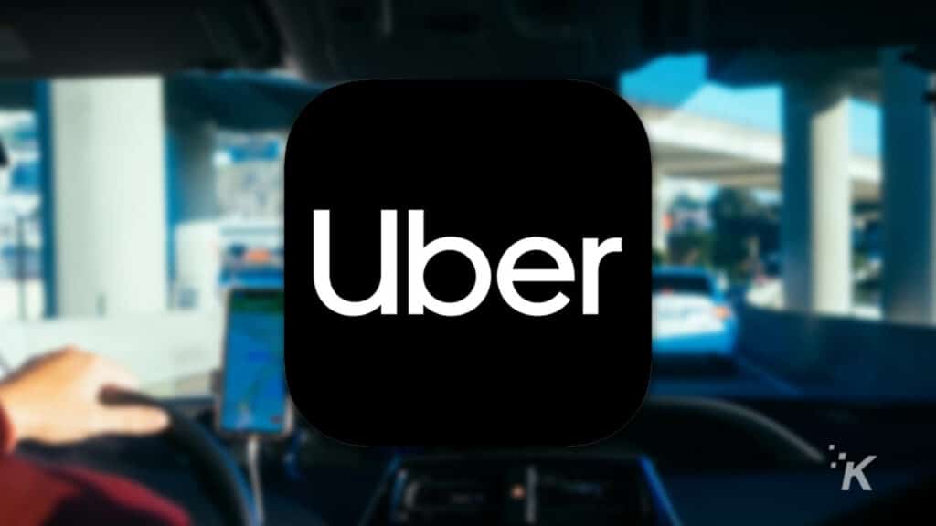 uber logo showing driver with blurred background