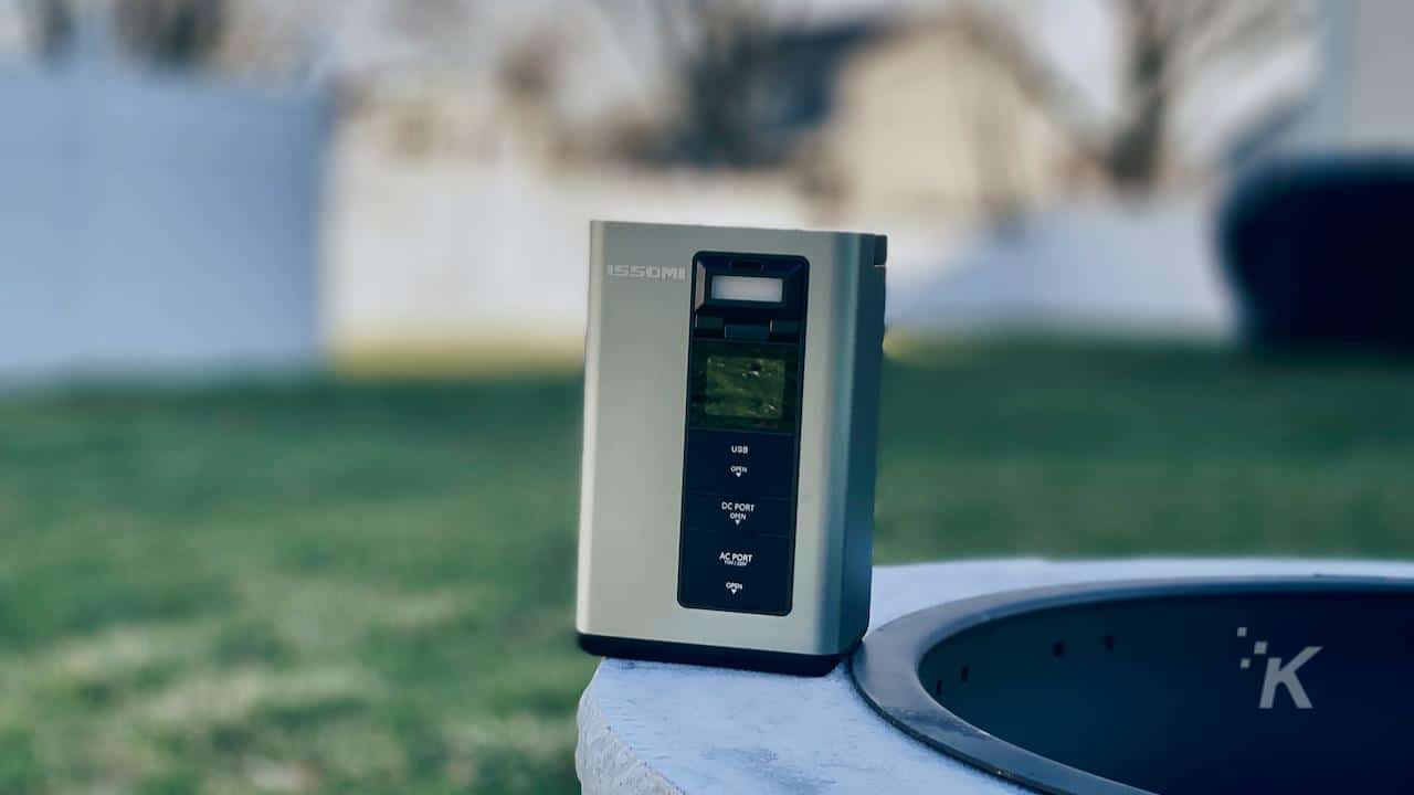 Image of a issomi portable power station with blurred background yard