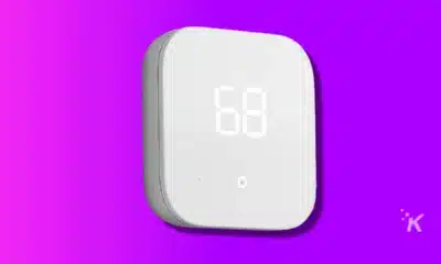 Image of an amazon smart thermostat on a purple background