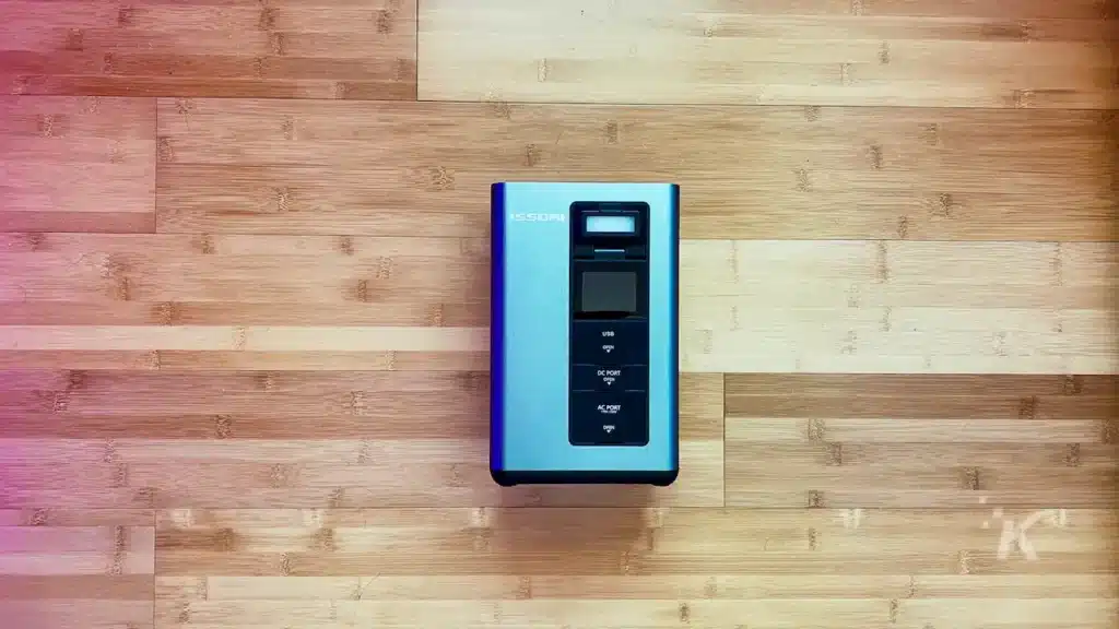 Portable battery pack from issomi on hardwood floor