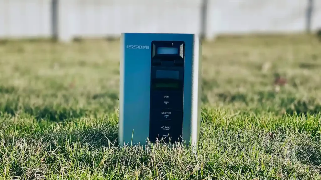 Image of a portable battery charger on grass