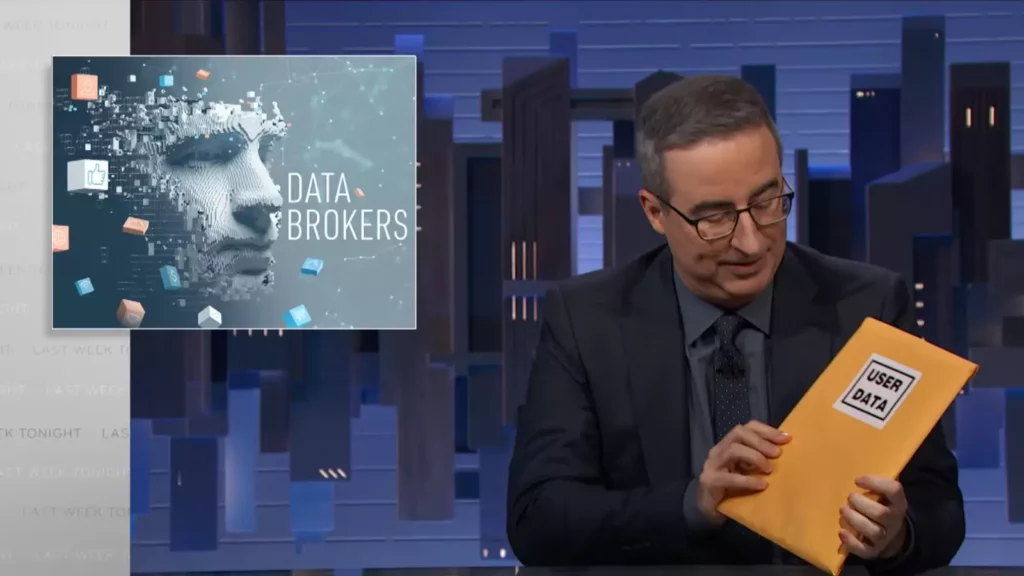 John oliver holding data folder