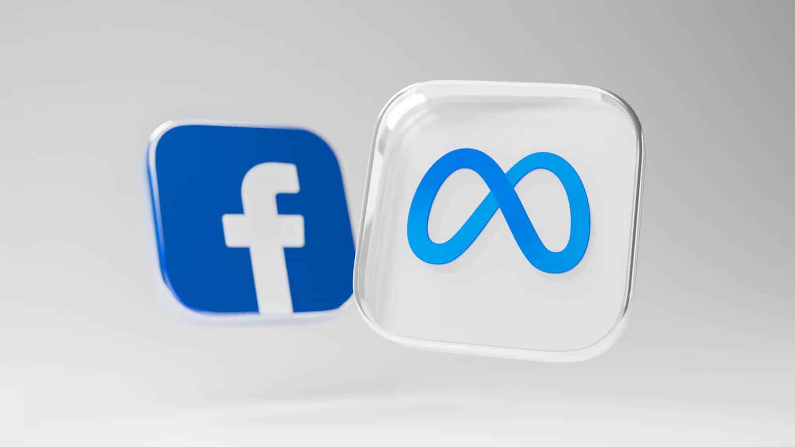 Meta and facebook logo on grey background